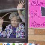 Friends and family celebrated the 112th birthday of Erna Zahn with a parade in front of her window at the Oak Hills Living Center, Tuesday, April 14, 2020 in New Ulm, Minn.