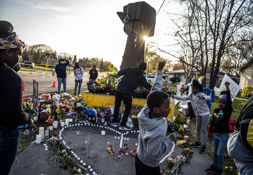 On Thursday, April 22, 2021, in Brooklyn Center, Minn., at the memorial site for Daunte Wright, Lamar Pettis, who is active in the BLM movement, brought his kids, L to R: Lauren,14, Lamar, 9, Lamiyah,9, and Zaniya, 6, to pay their respects