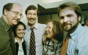 Richard Read and Brent Walth flank managing editor Amanda Bennett, second from right