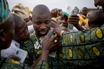 SJ.NIG.06 &#8211; MC Musiliu Oluomo, one of the most powerful Area Boy leaders in Lagos, at a wedding in Isolo, Lagos, 2008