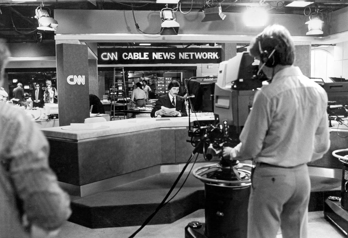 In 1980, when the three major TV networks devoted only 30 minutes to the evening news, Ted Turner bet on a much bigger appetite for current events. He launched Cable News Network (CNN), the nation’s first 24-hour-a-day, seven-day-a-week, all-news network. Its watershed moment arrived in 1991 when it provided the only live TV coverage of the start of the first Persian Gulf War. The live footage of the bombings, picked up by stations and networks around the world, was seen by one billion viewers. Today, CNN International is available in more than 200 countries.