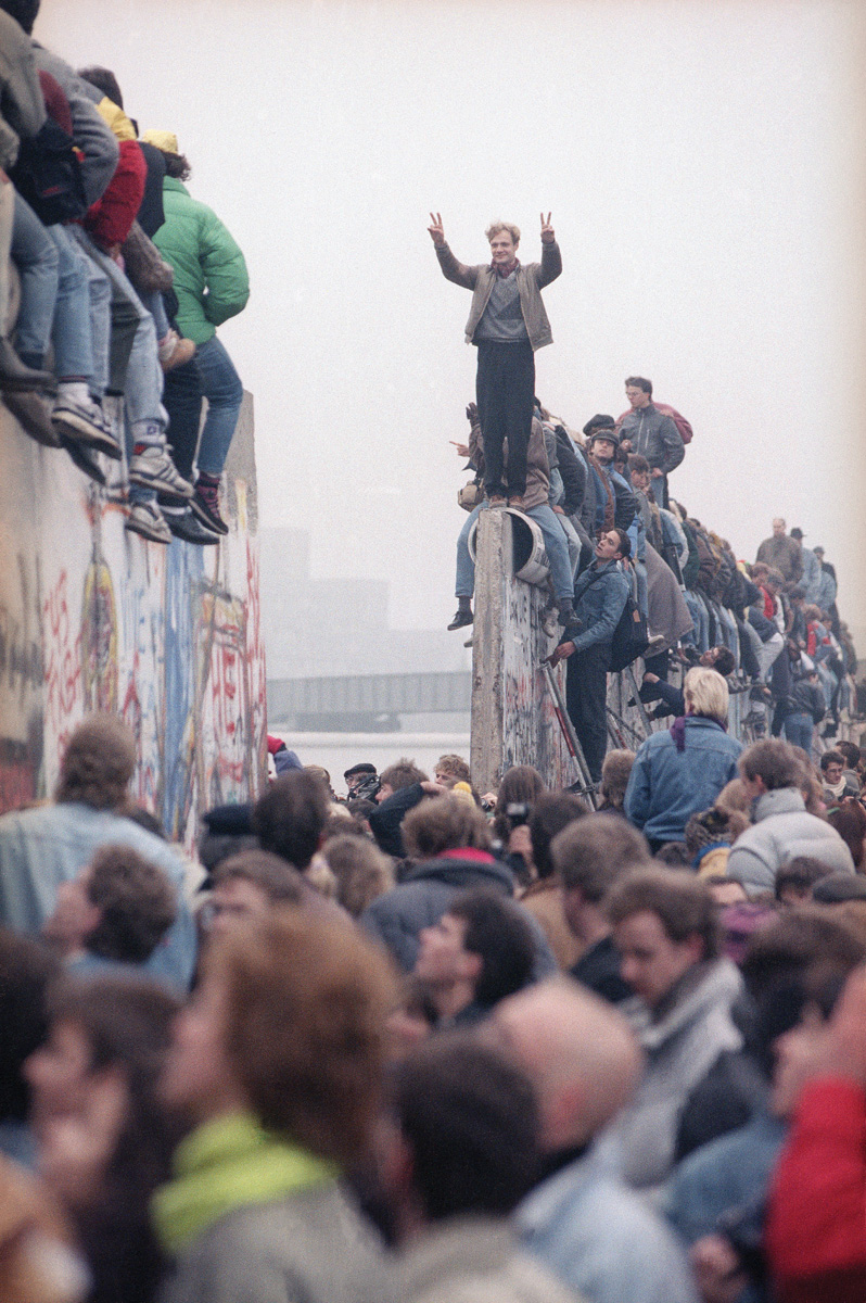 East and West Germans celebrate the fall of the Berlin Wall, November 1989