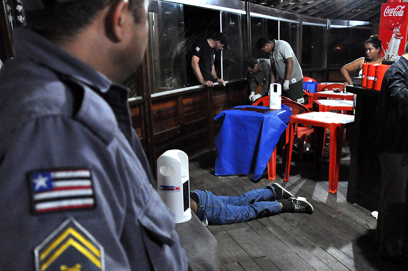 The body of Brazilian journalist Décio Sá at the bar where he was shot and killed on April 23, 2012. Authorities moved quickly to solve the murder of Sá, one of Brazil's most popular bloggers; attacks on less-prominent journalists have not received the same attention