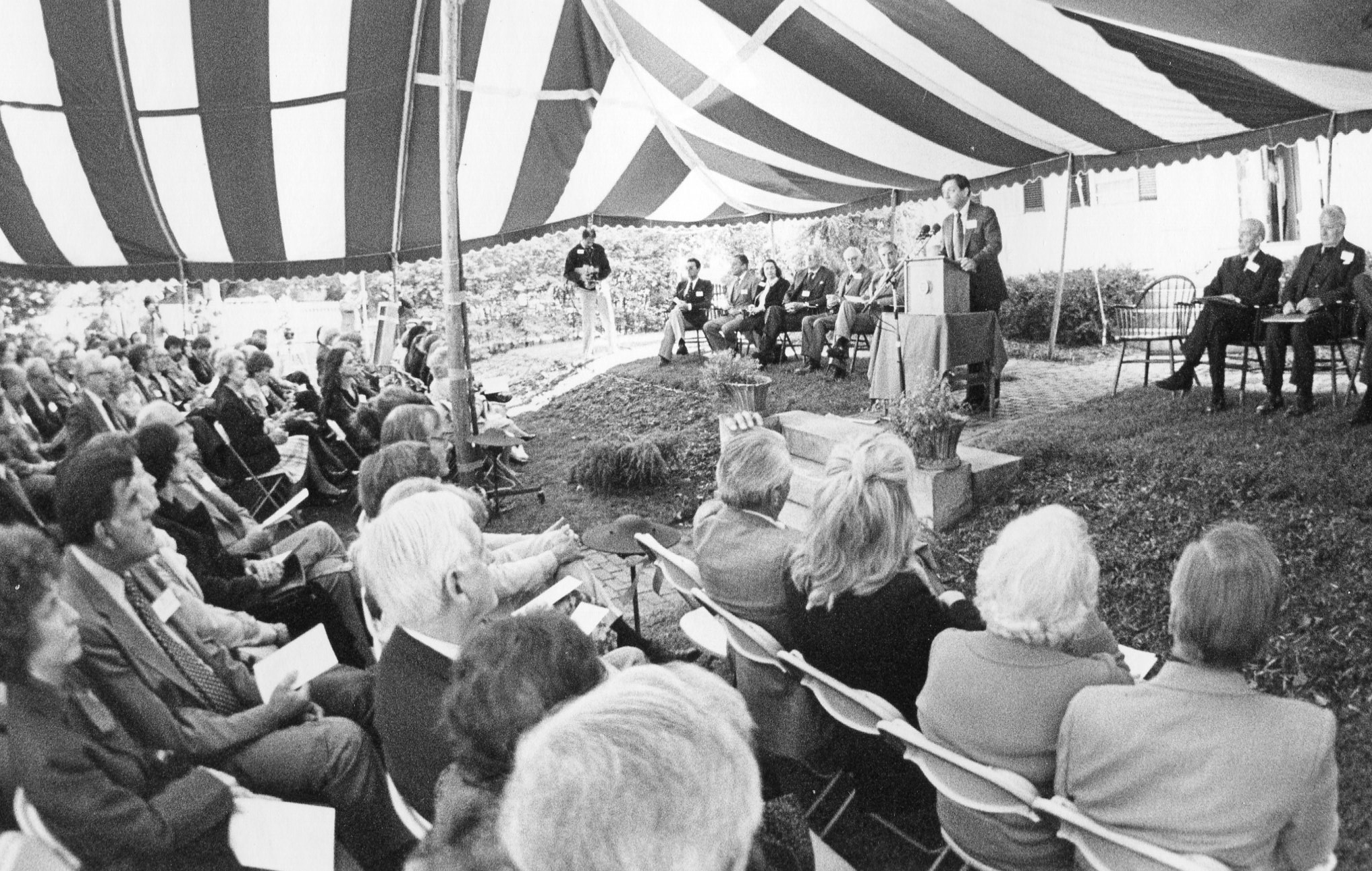 Curator James C. Thomson, Jr. welcomes guests to the dedication ceremony for Walter Lippmann House on September 23, 1979