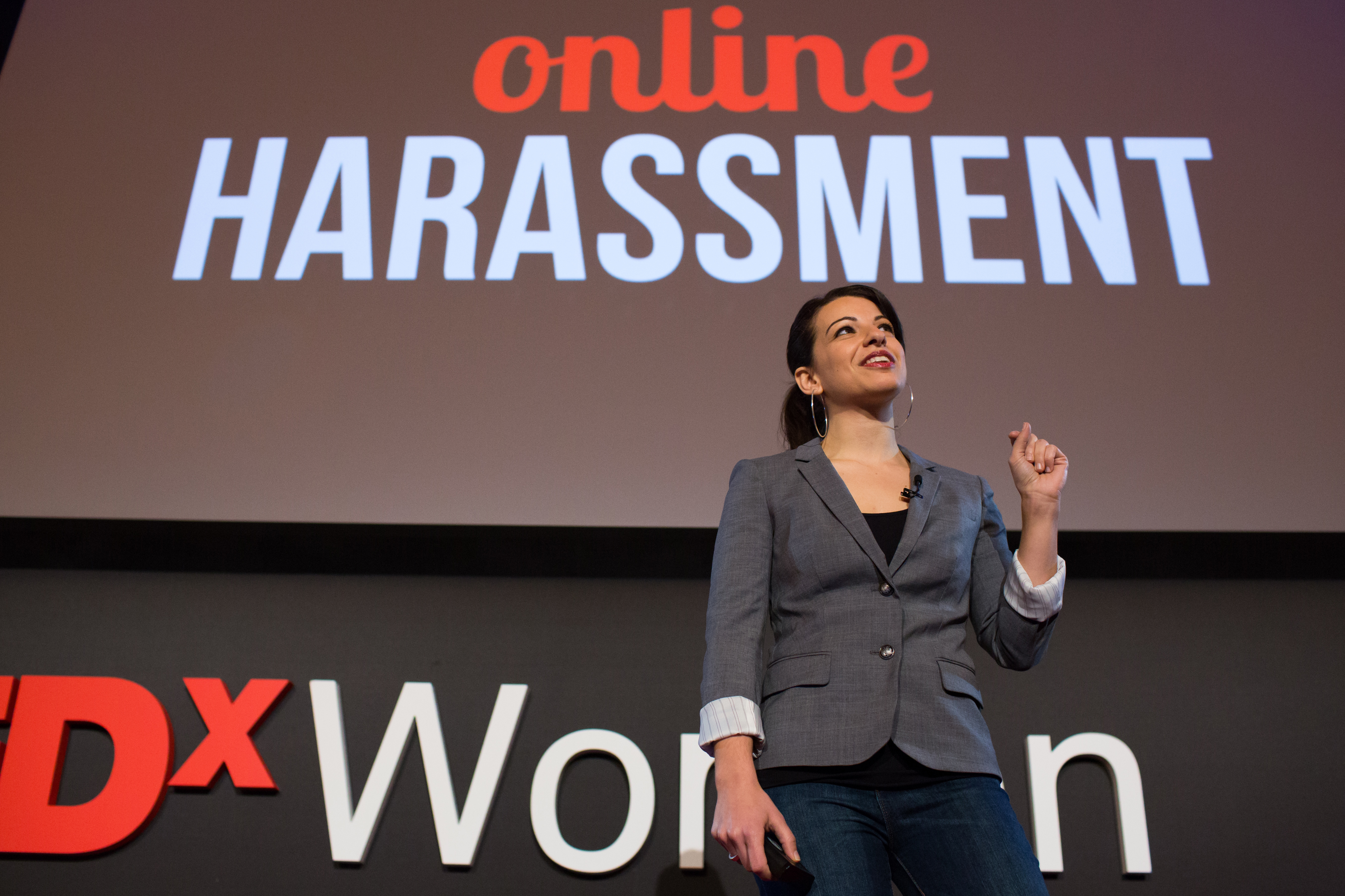 Anita Sarkeesian, below at a TEDxWomen talk, has been threatened with violence for her critiques of video game culture