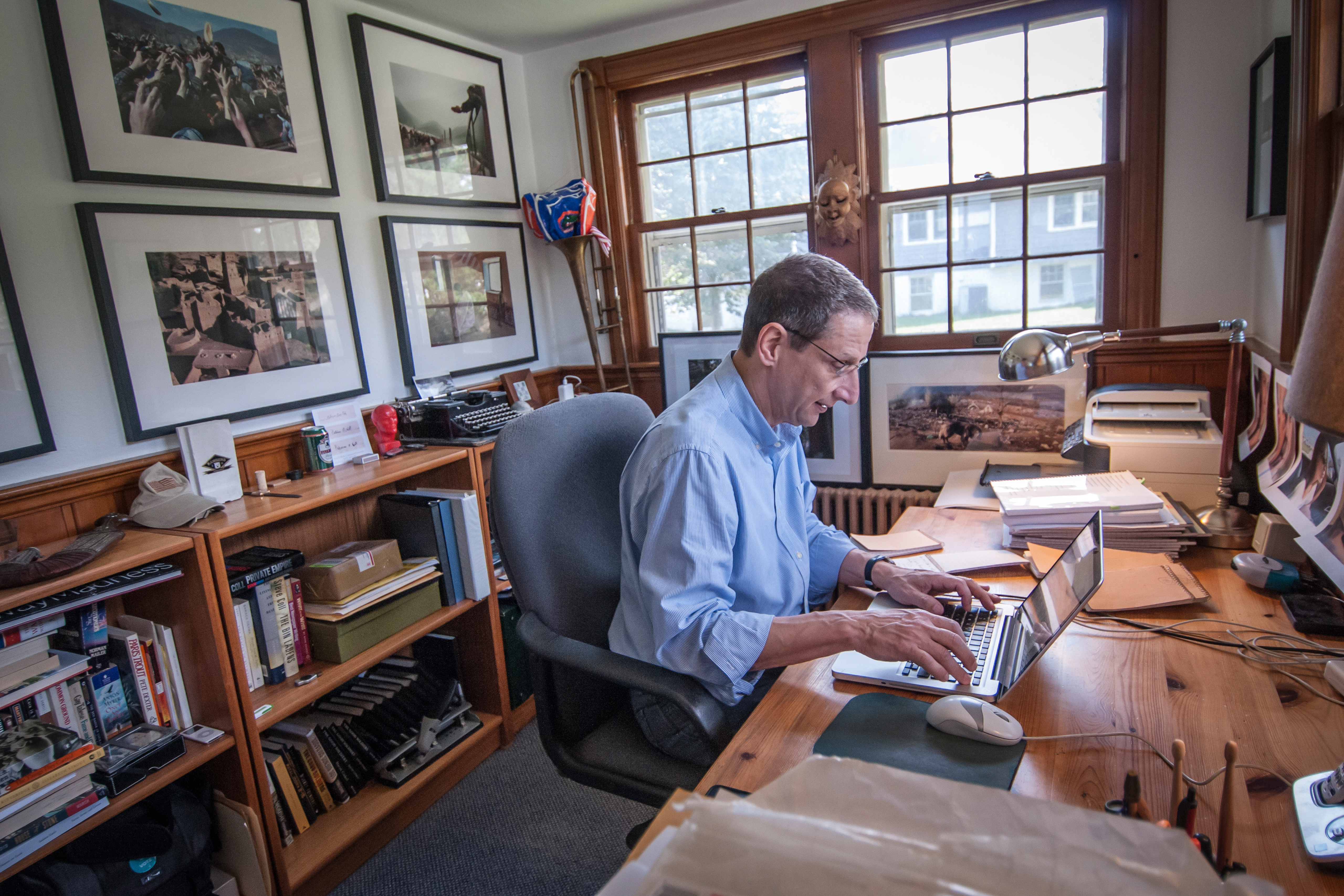 David Finkel, shown in his home office, would rather observe his subjects than interview them