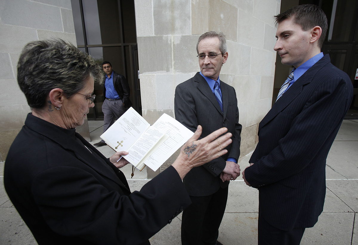 The book “Equal Before the Law” tells the story behind the 2009 Iowa Supreme Court ruling that same-sex marriage is legal, a decision that made possible this marriage ceremony in Des Moines