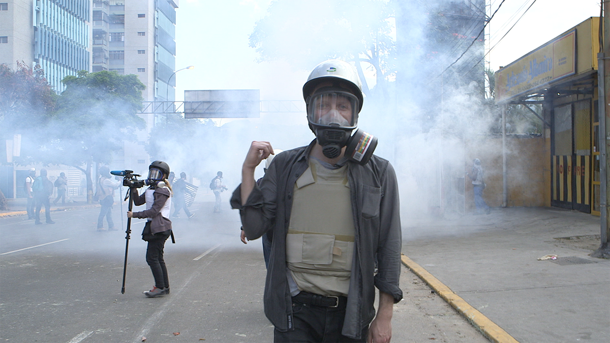 Alex Miller, reporting in 2014 during anti-government protests in Caracas, Venezuela 