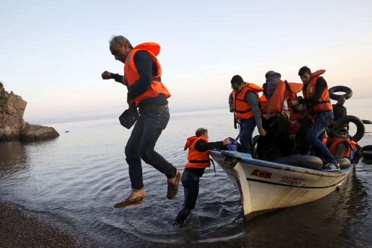 In a six-part series of 10-minute videos, “The Journey from Syria,” The New Yorker records the harrowing trip of a refugee—not unlike those shown here, disembarking from a fishing boat on a beach on the Greek island of Lesbos—as he escapes Damascus for Europe