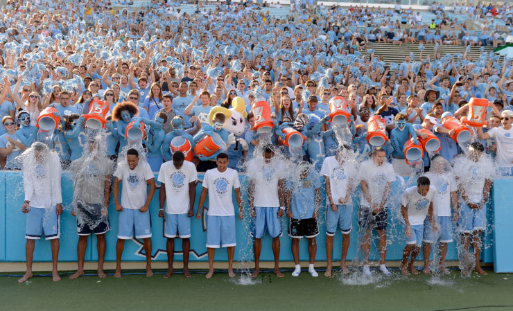 Members of the North Carolina Tar Heels men's basketball team participate in the ALS Ice Bucket Challenge. On Facebook, the challenge crowded out posts about the Ferguson protests in August 2014