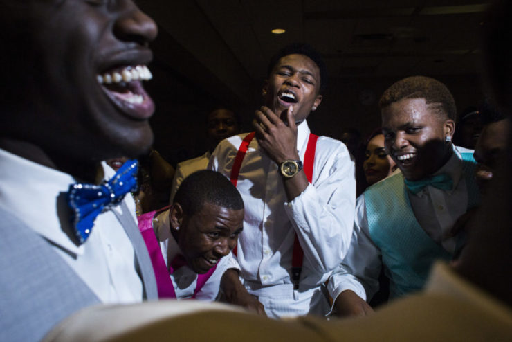 Friends dance at a school prom in Flint, Michigan