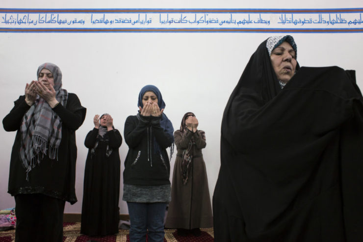 Congregation members pray at Michigan’s Az-Zahra Islamic Center