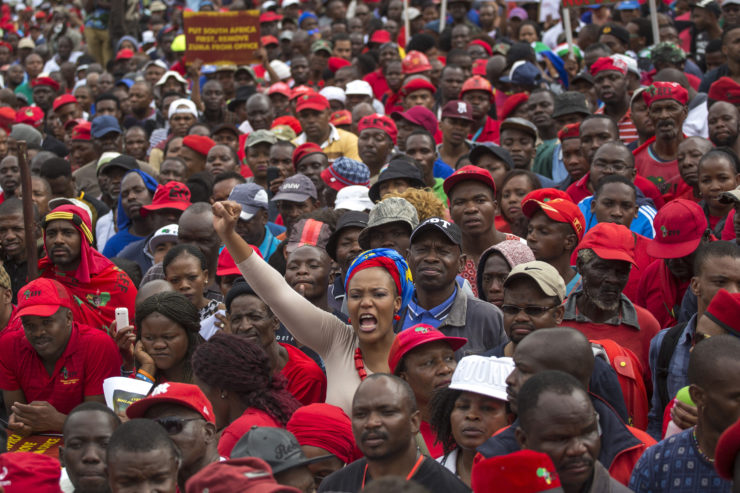 Demonstrators calling for the resignation of President Jacob Zuma rally in Pretoria, South Africa in April 