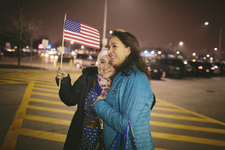 Baraa, a refugee from Syria, embraces Marti Mendoza outside of Chicago O'Hare International Airport on February 7, as federal judges were considering a lower court's ruling that allowed previously barred travelers and immigrants from seven predominantly Muslim countries to enter the country 