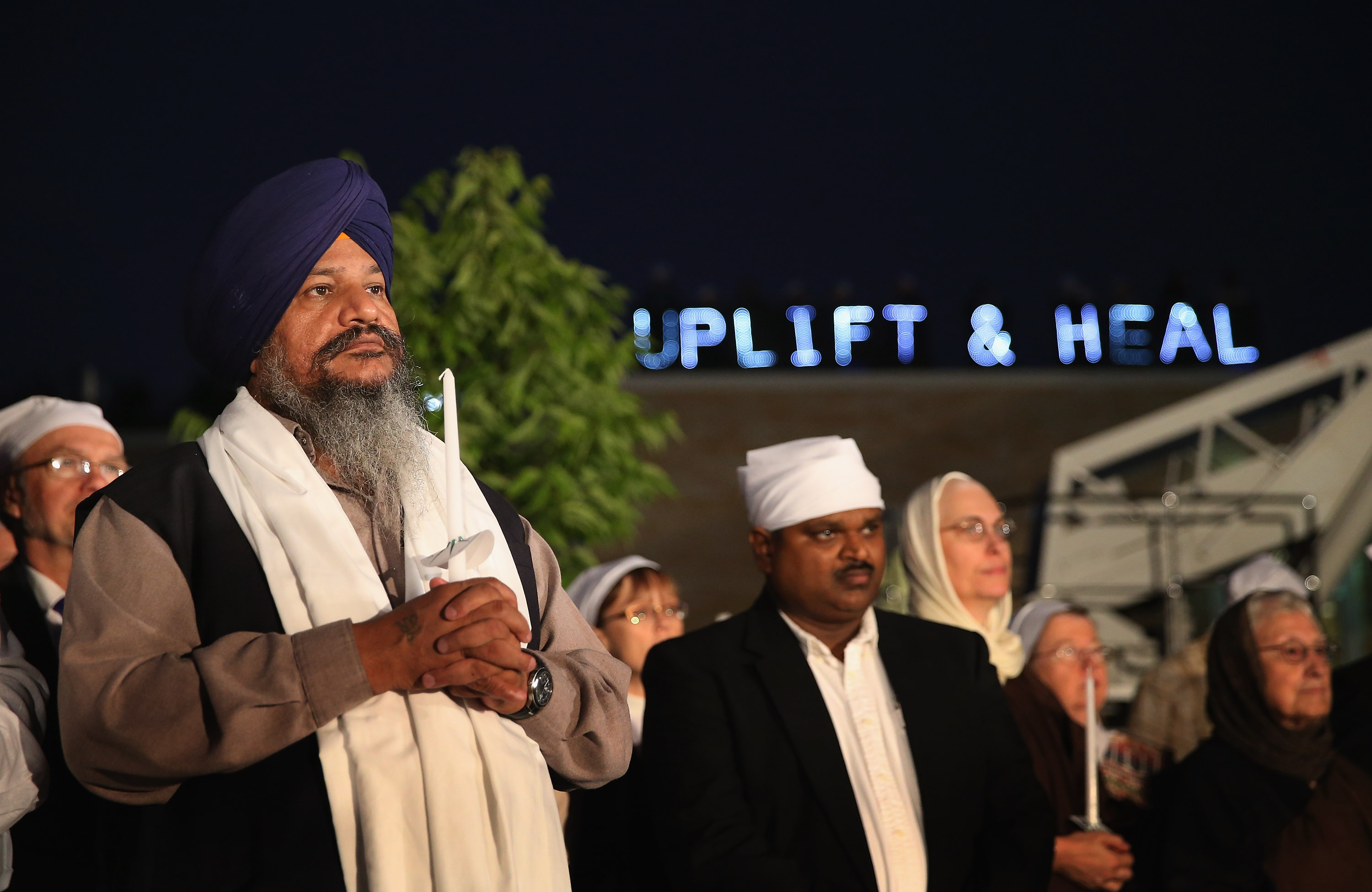 Members of the Sikh Temple of Wisconsin and supporters attend a vigil to mark the anniversary of the August 5, 2013 shooting at the temple, when white supremacist Michael Page killed six members. HuffPo’s Asian Voices, which launched in the spring of 2017, has featured coverage of anti-Sikh hate crimes