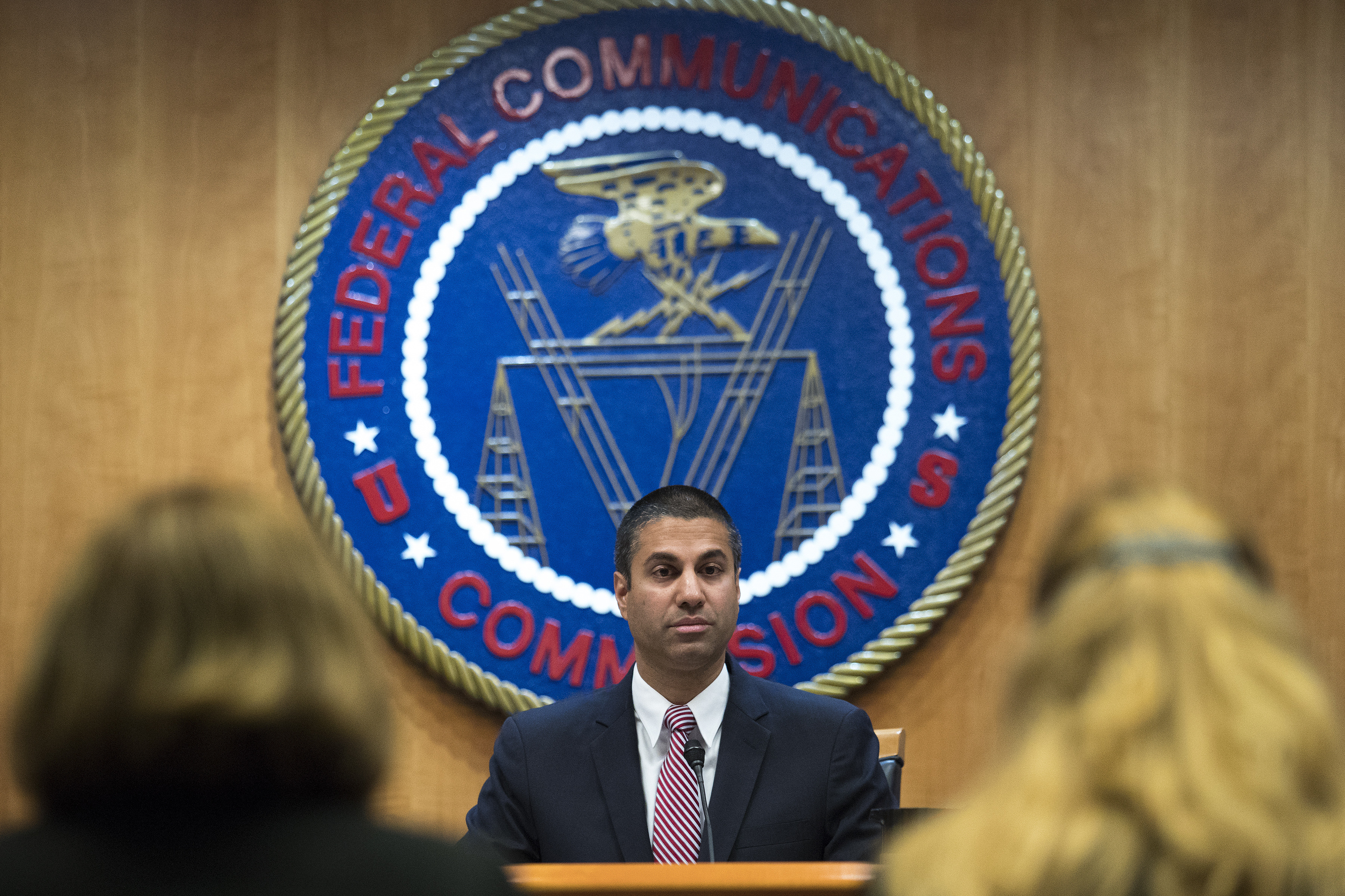 Ajit Pai, chairman of the FCC, delivers remarks at FCC headquarters in 2017. The FCC has recently rolled back rules limiting media ownership, paving the way for the acquisition of Tribune Media by Sinclair, which already is the nation’s largest broadcaster, with more than 190 stations