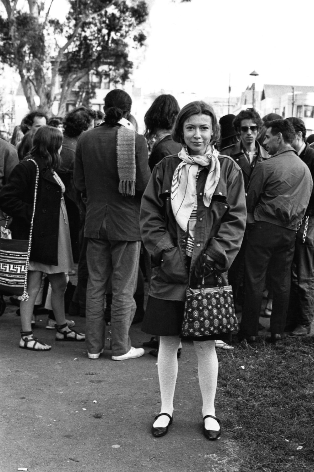 Joan Didion stands in 
Golden Gate Park in 1967