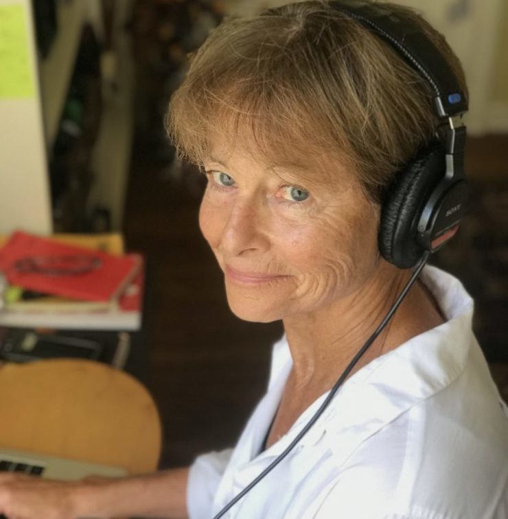 Cynthia Gorney in her home writing office, learning to podcast