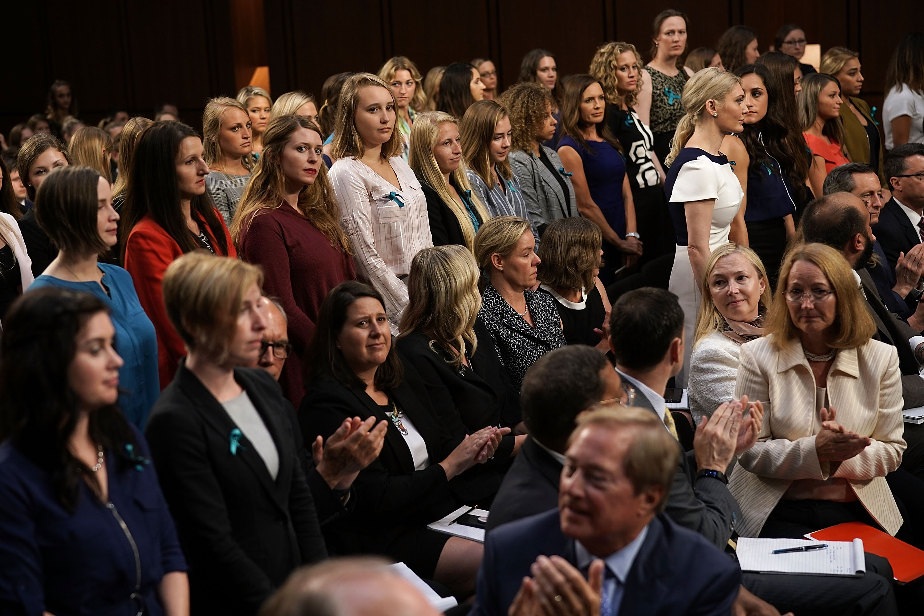 Sexual abuse survivors from the Larry Nassar sexual abuse case stand up as they are acknowledged during a Senate Commerce, Science, and Transportation Committee hearing focusing on changes made by the United States Olympic Committee, USA Gymnastics, and Michigan State University to protect athletes from abuse
