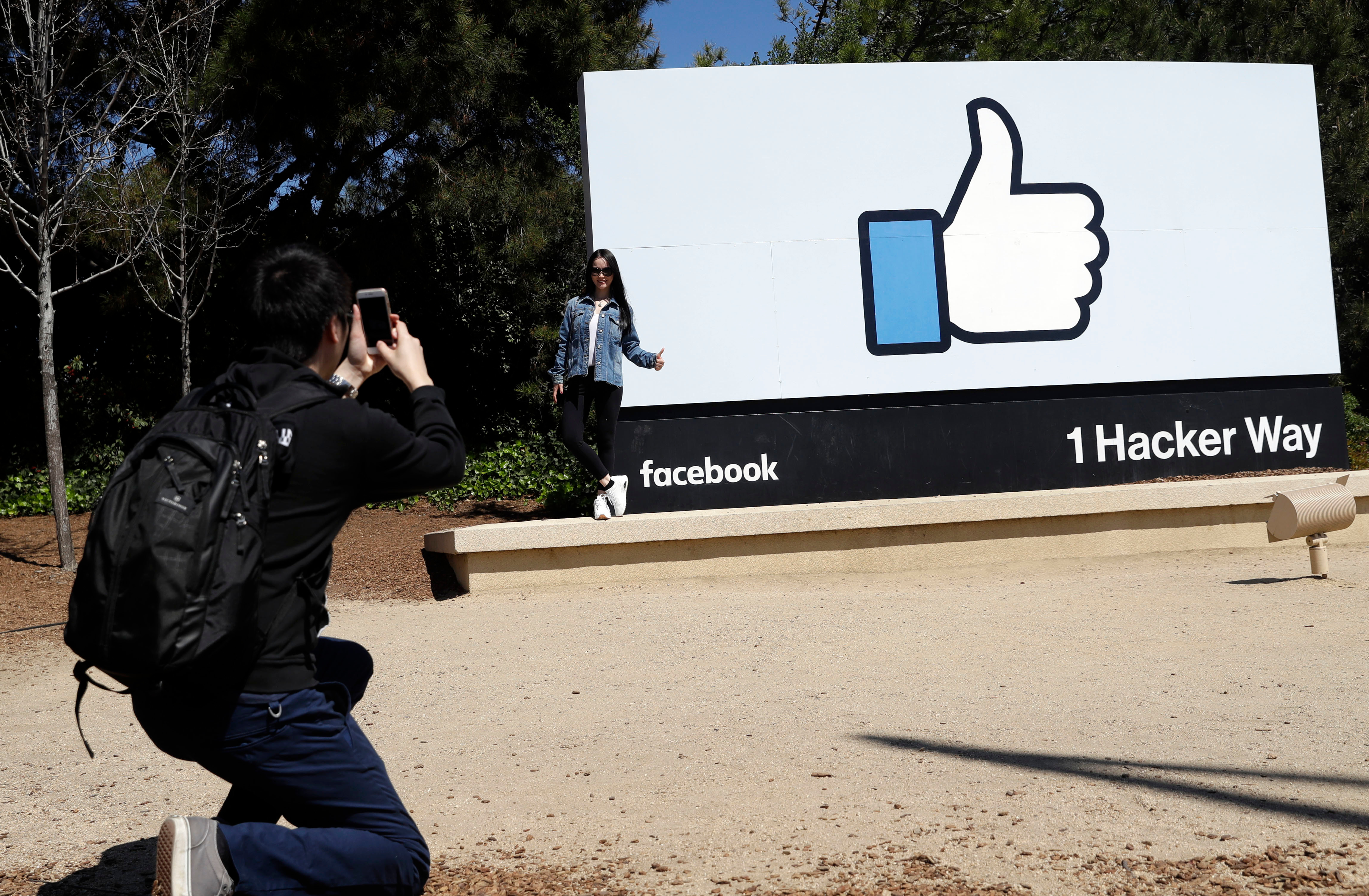 Facebook thumbs up on a sign