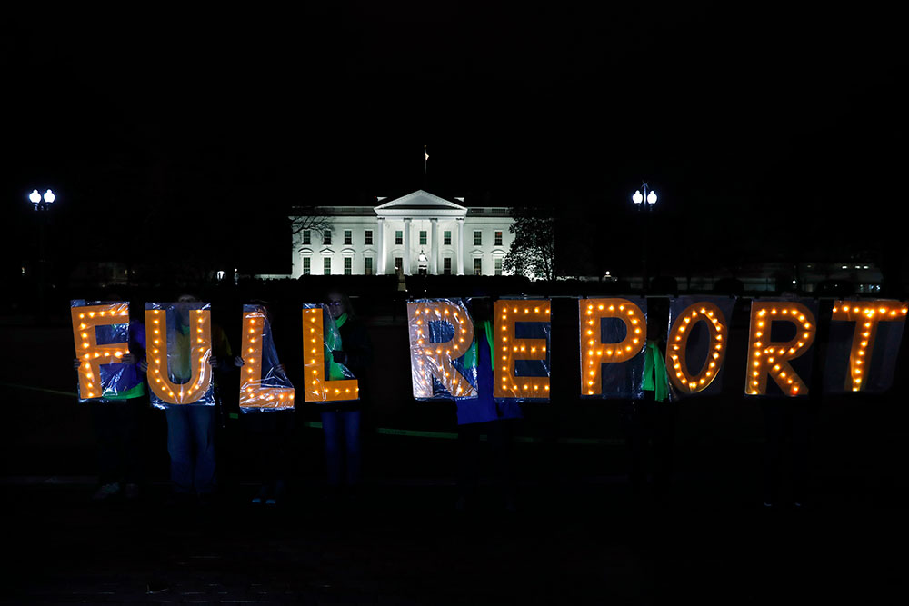Protesters outside the White House in Washington, D.C. on March 25, 2019 call for the release of the complete report of special counsel Robert Mueller's investigation