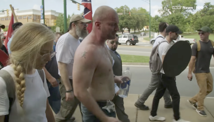 In a screenshot from the “Vice News Tonight” documentary “Charlottesville: Race and Terror,” Elle Reeve walks with white nationalist Christopher Cantwell during the "Unite the Right" rally in Charlottesville in August 