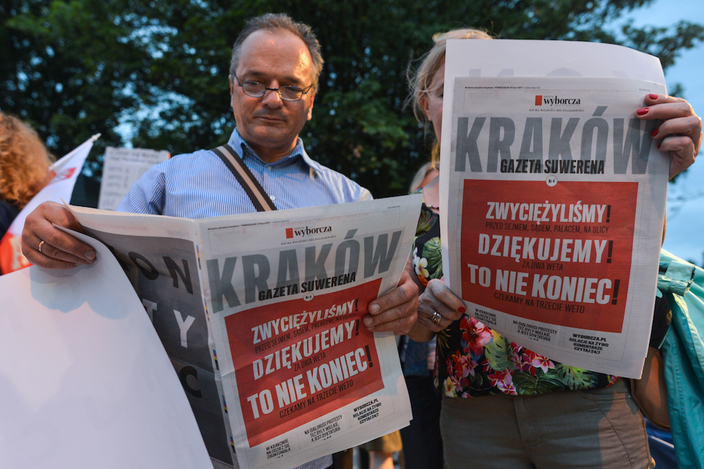 People read the latest news in Gazeta Wyborcza. The newspaper, Poland’s most widely circulated broadsheet, is a prime target of President Andrzej Duda