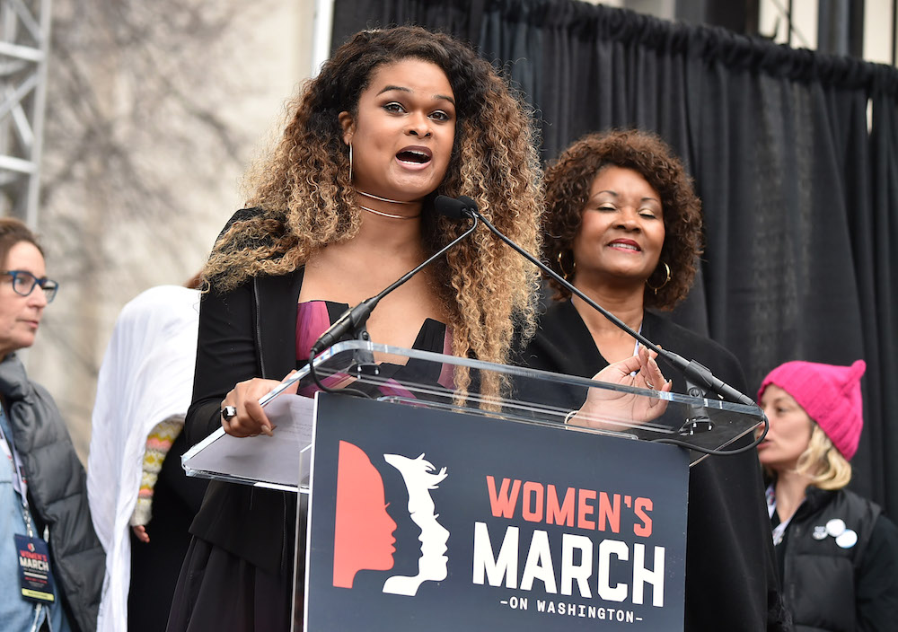 Out magazine’s executive editor Raquel Willis, who is trans, speaks at the Women’s March on Washington in 2017