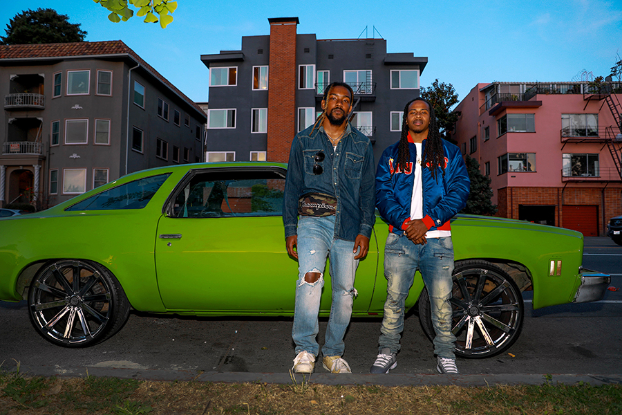 Cousins Kingdom Chambers (left), 27, and Kuda Mills, 27, pose for a portrait in front of Kuda's 1973 Chevelle on Mother's Day 2019  in Oakland, California. The San Francisco Chronicle publishes an unusually high number of photographs by women, in part because six of 10 staff photographers are women