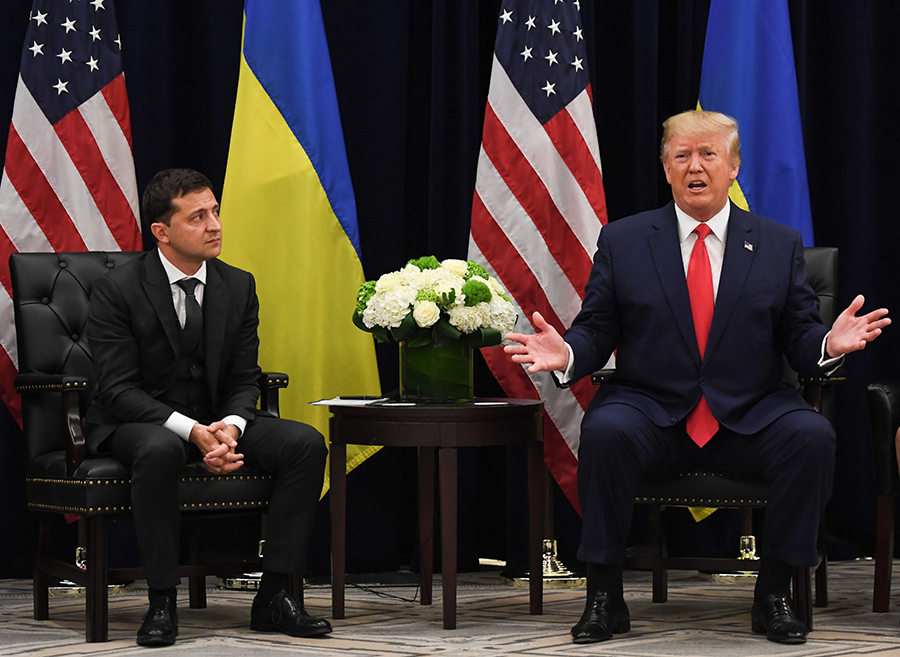 President Donald Trump and Ukrainian President Volodymyr Zelensky  during a meeting in New York on September 25. Trump's pressuring of Ukraine's president is part of an unfolding scandal and impeachment inquiry