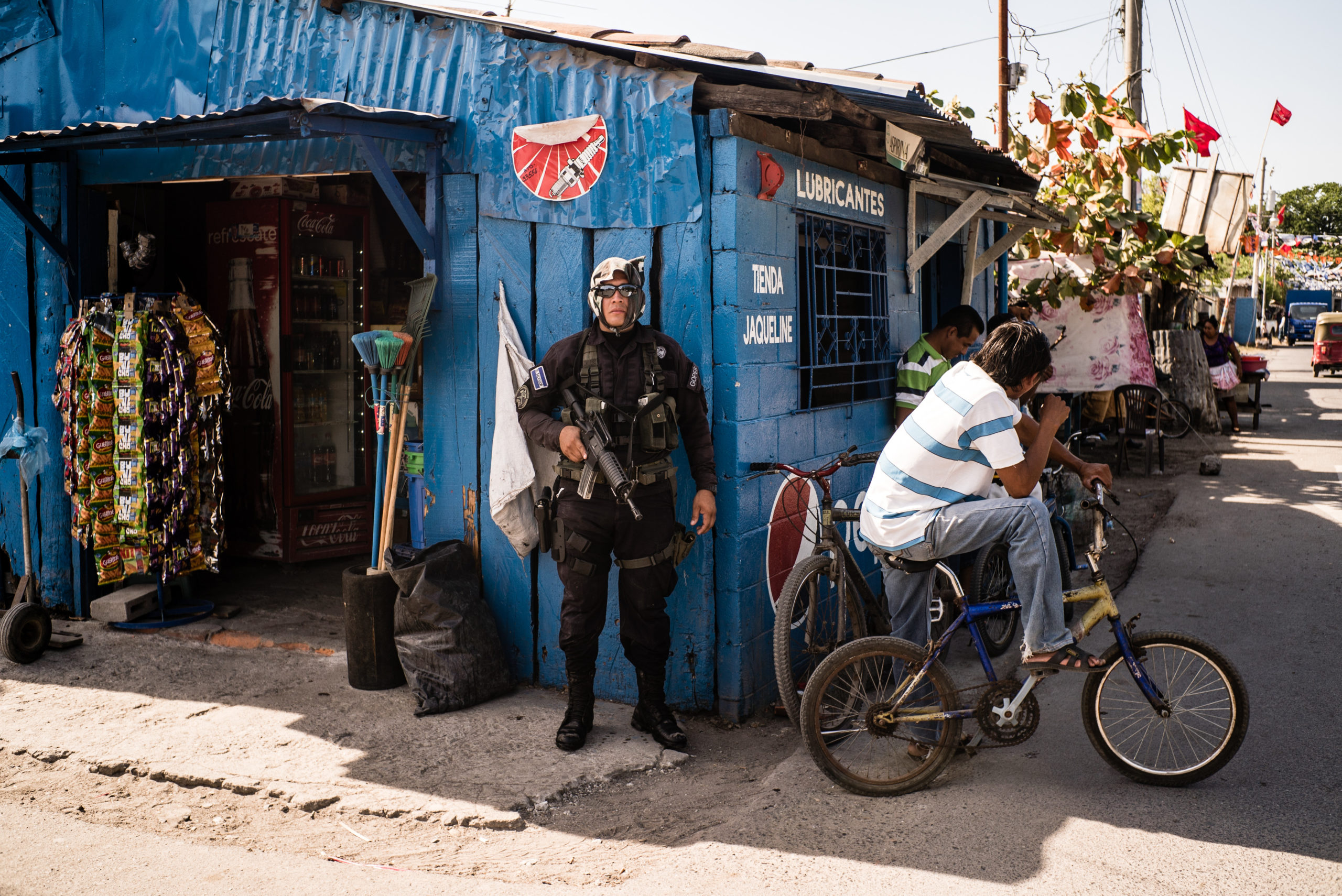 A special anti-gang police member patrols the streets in Herradura, El Salvador.