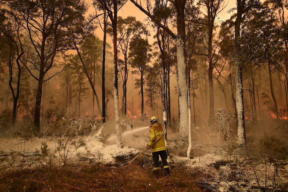 Firefighters fight Australia bushfires