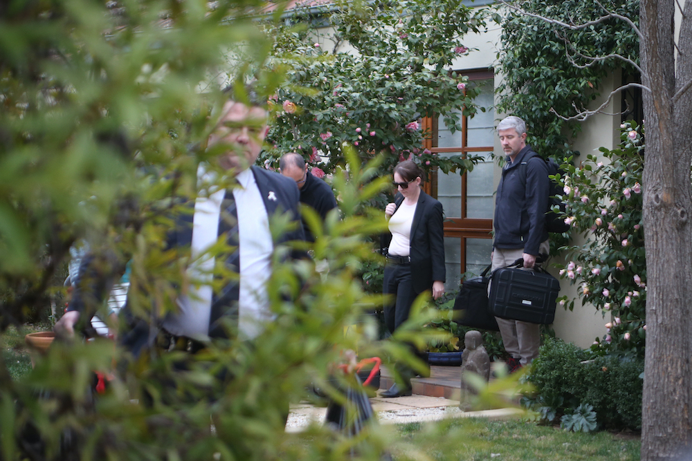 Australian police execute a search warrant on the home of an intelligence officer in Canberra in September 2019, a raid related to a prior one on journalist Annika Smethurst’s home over a story she wrote about the Australian Signals Directorate