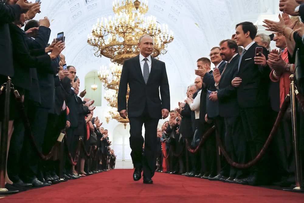 Vladimir Putin enters the Grand Kremlin Palace in Moscow, Russia to take the oath during his inauguration ceremony after being reelected as Russia's president in 2018
