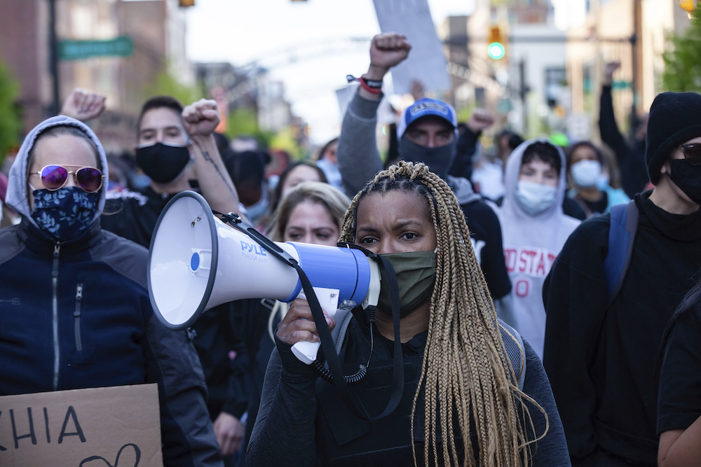 Hana Abdur-Rahim, a local organizer, leads Black Lives Matter activists in a march back to Goodale Park during a protest against the police killing of Ma'Khia Bryant on April 25, 2021.