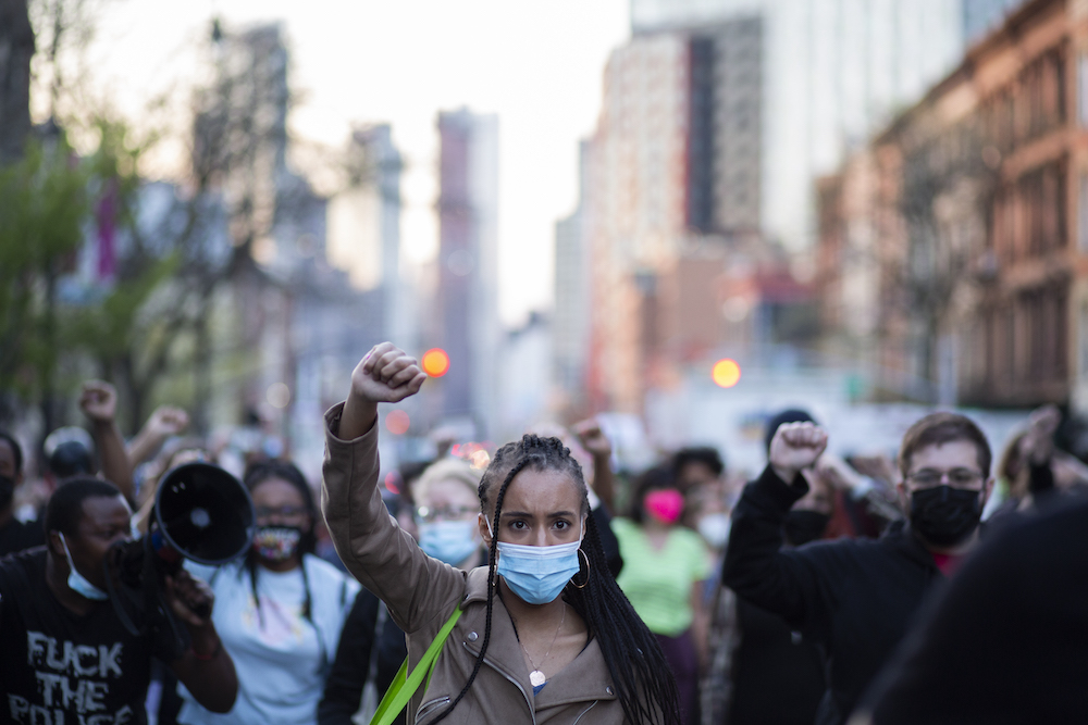 A photograph taken by The Haitian Times of a Black Lives Matter march in New York City following the April 20, 2021, conviction of former Minneapolis police officer Derek Chauvin in the murder of George Floyd