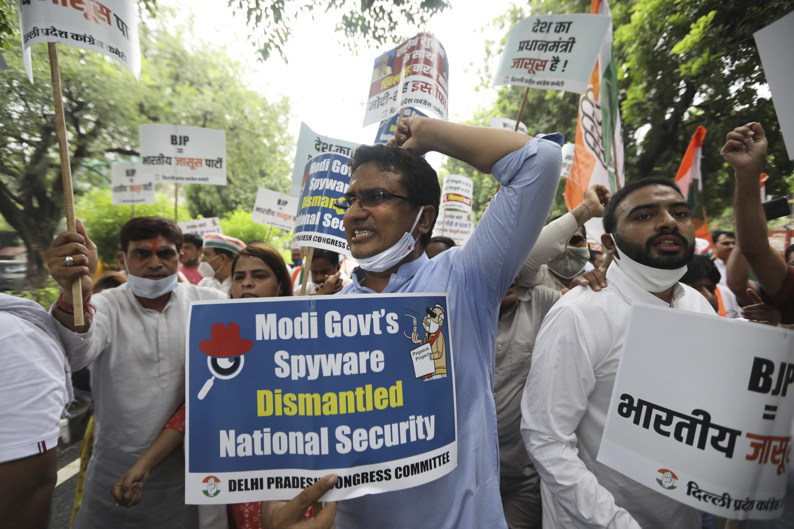 Congress party workers shout slogans during a protest accusing Prime Minister Narendra Modi’s government of using military-grade spyware to monitor political opponents, journalists, and activists in New Delhi. An investigation by a global media consortium provided evidence that the spyware from Israel-based NSO Group was used to allegedly infiltrate devices belonging to a range of targets in 50 countries. 