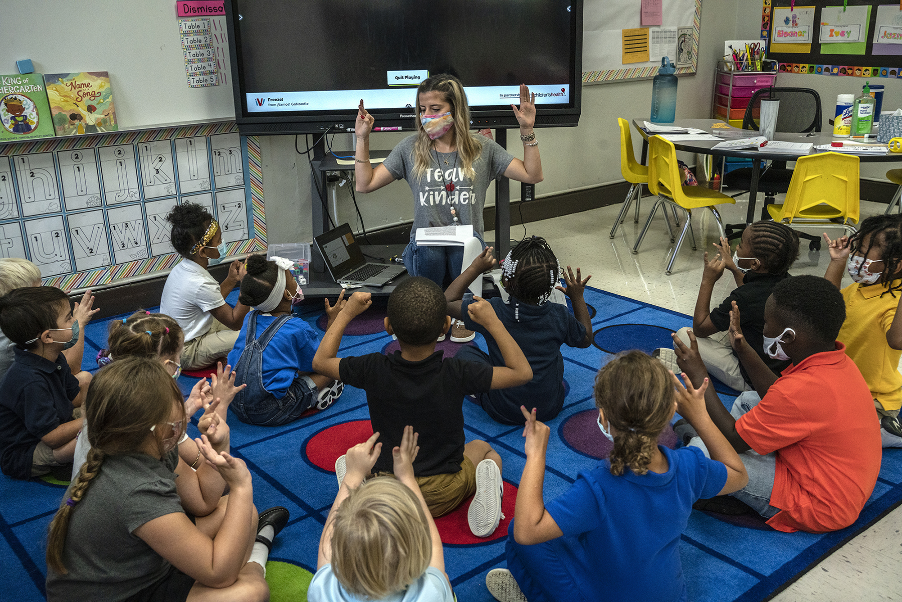 Kindergarten teacher Mrs. Amber Updegrove interacts with her students at Warner Arts Magnet Elementary in Nashville, Tennessee, on Friday, Aug. 20, 2021. All of her students were masked up at the school