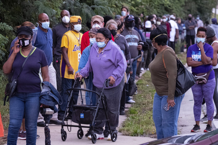 People wait in a long line to vote in Decatur, Georgia in October 2020.