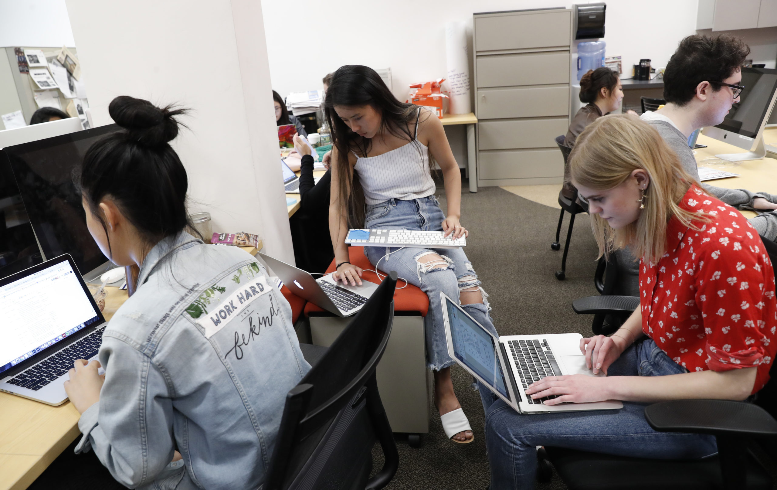 Students at the Washington Square News at New York University work on deadline in the paper's newsroom. Many of the traditional entry paths to journalism, like the private school newspaper route, are inaccessible for most people