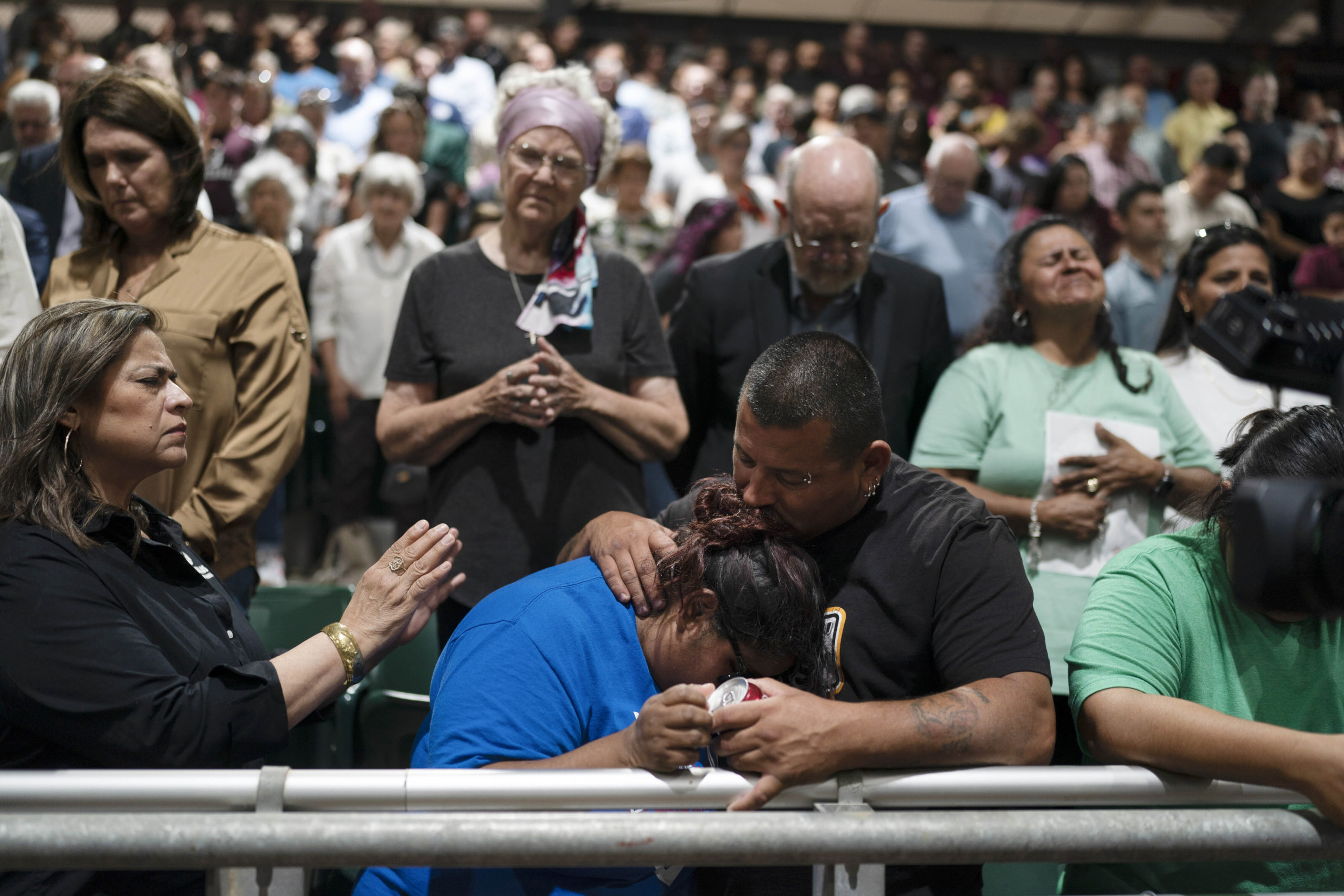 Two family members of one of the victims killed in Tuesday's shooting at Robb Elementary School comfort each other during a prayer vigil in Uvalde, Texas, Wednesday, May 25, 2022. (AP Photo/Jae C. Hong)