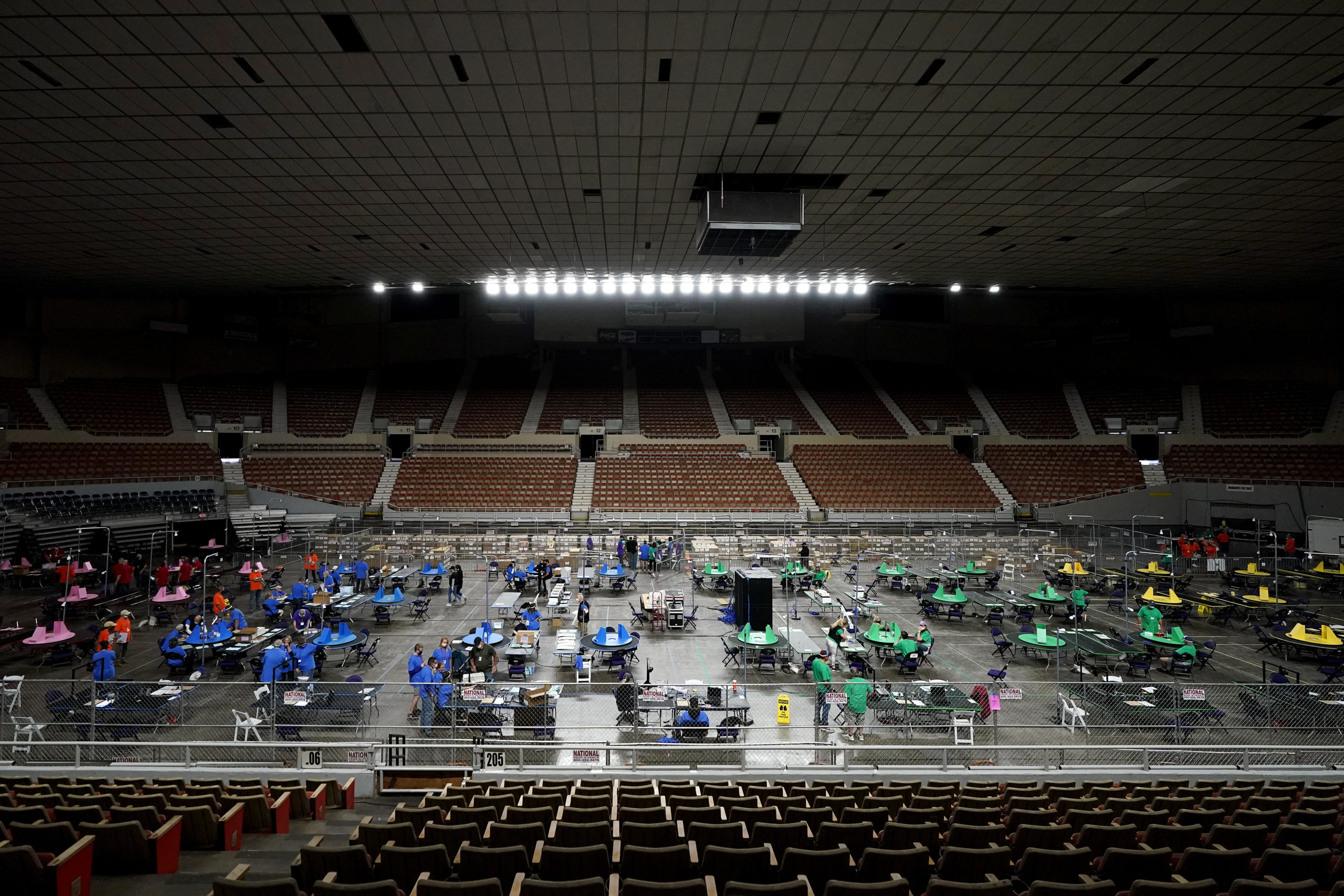 Maricopa County ballots cast in the 2020 general election are examined and recounted by contractors working for Florida-based company, Cyber Ninjas, May 6, 2021, at Veterans Memorial Coliseum in Phoenix