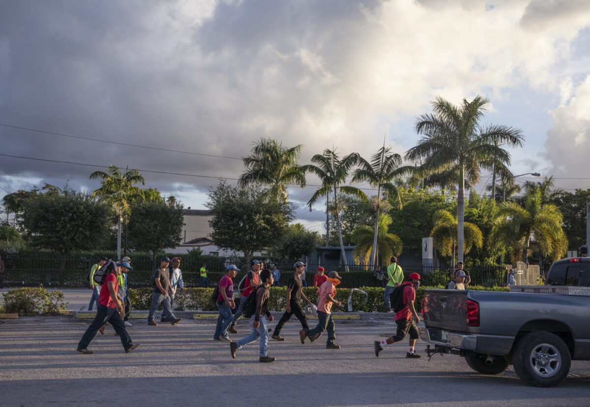 Migrant children were among the day laborers who gathered on a school day in Homestead, Florida, to find roofing, landscaping or other work.
